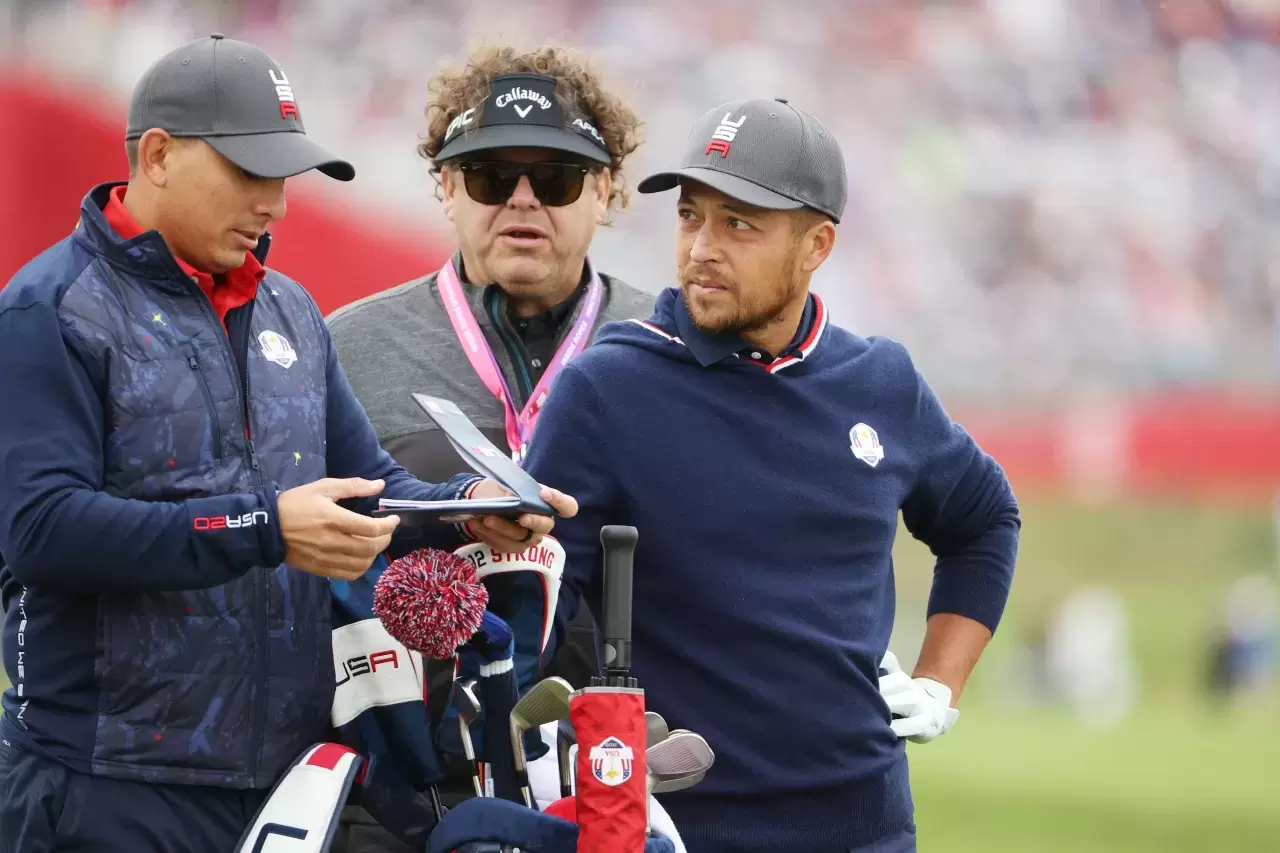 Xander Schauffele of team United States (R) and his father Stefan Schauffele look on prior to the 43rd Ryder Cup at Whistling Straits