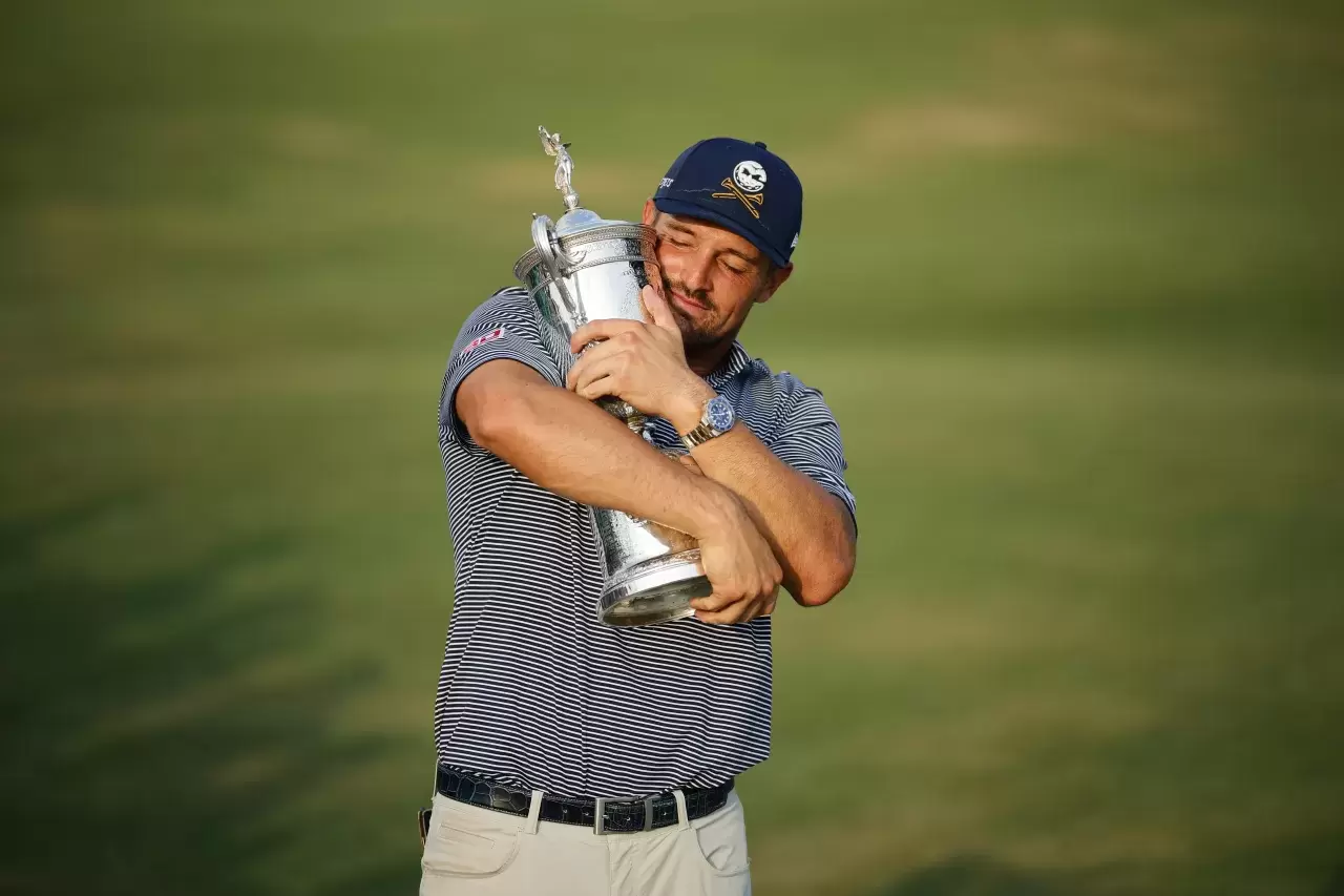  Bryson DeChambeau of the United States poses with the trophy after winning the 124th U.S. Open at Pinehurst Resort on June 16, 2024 in Pinehurst, North Carolina