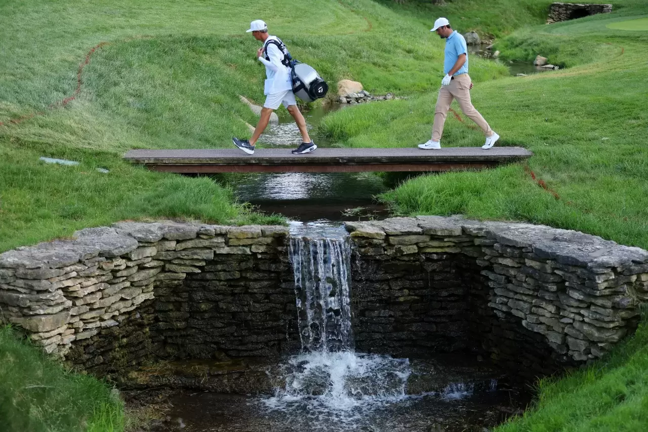 Scottie Scheffler of the United States reacts after making par on the 16th green during the final round of the Memorial Tournament presented by Workday at Muirfield Village Golf Club on June 09, 2024 in Dublin, Ohio
