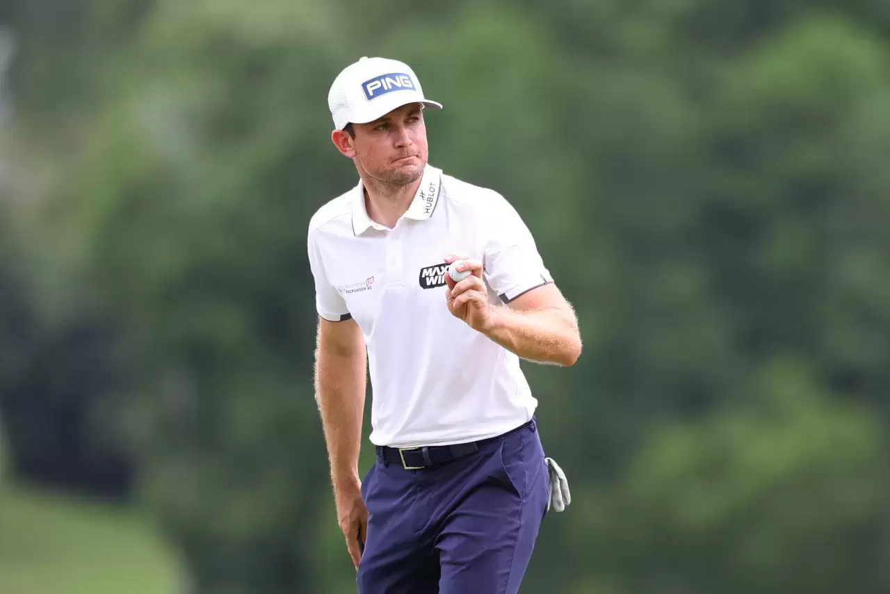 Joel Girrbach of Switzerland acknowledges the spectators after putting on the 13th green during day four of the Volvo China Open 2024 at Shenzhen Yinxiu Golf Club on May 05, 2024 in Shenzhen, China..jpg