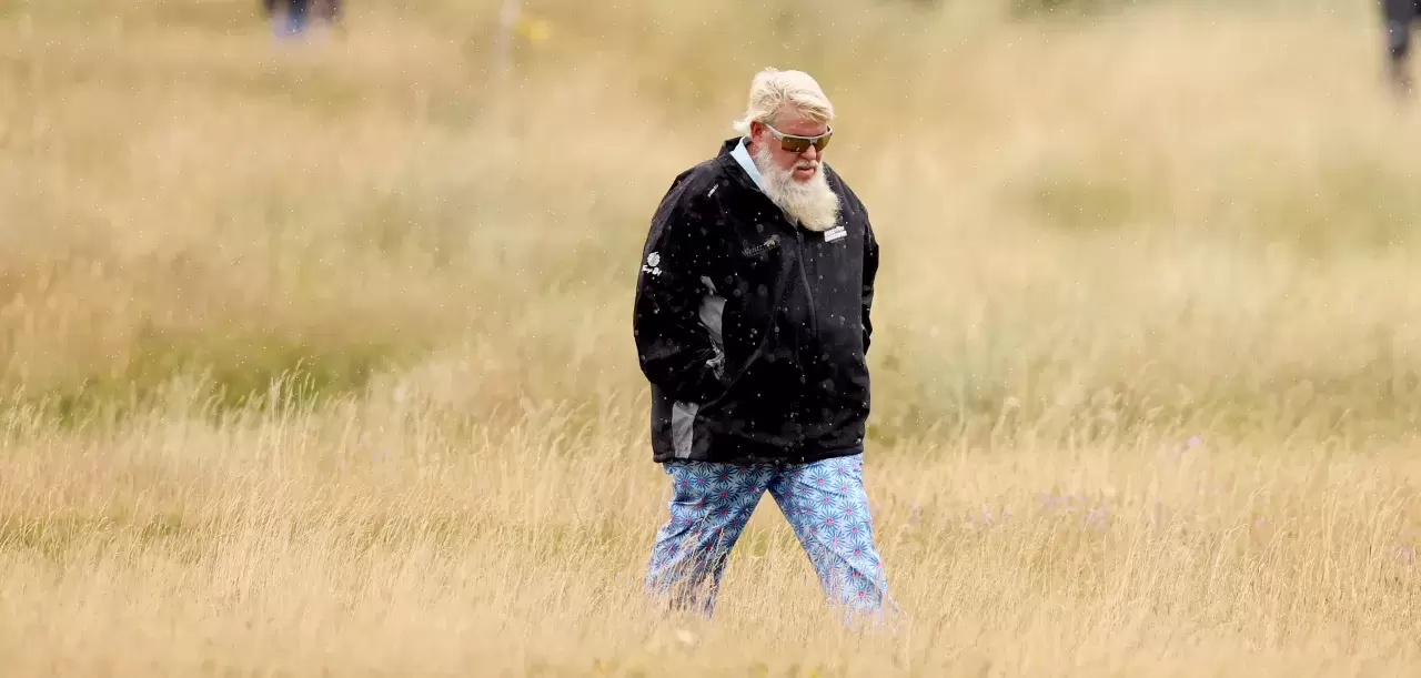 John Daly of the United States walks on the second hole during a practice round prior to The 152nd Open championship at Royal Troon on July 16, 2024 in Troon, Scotland