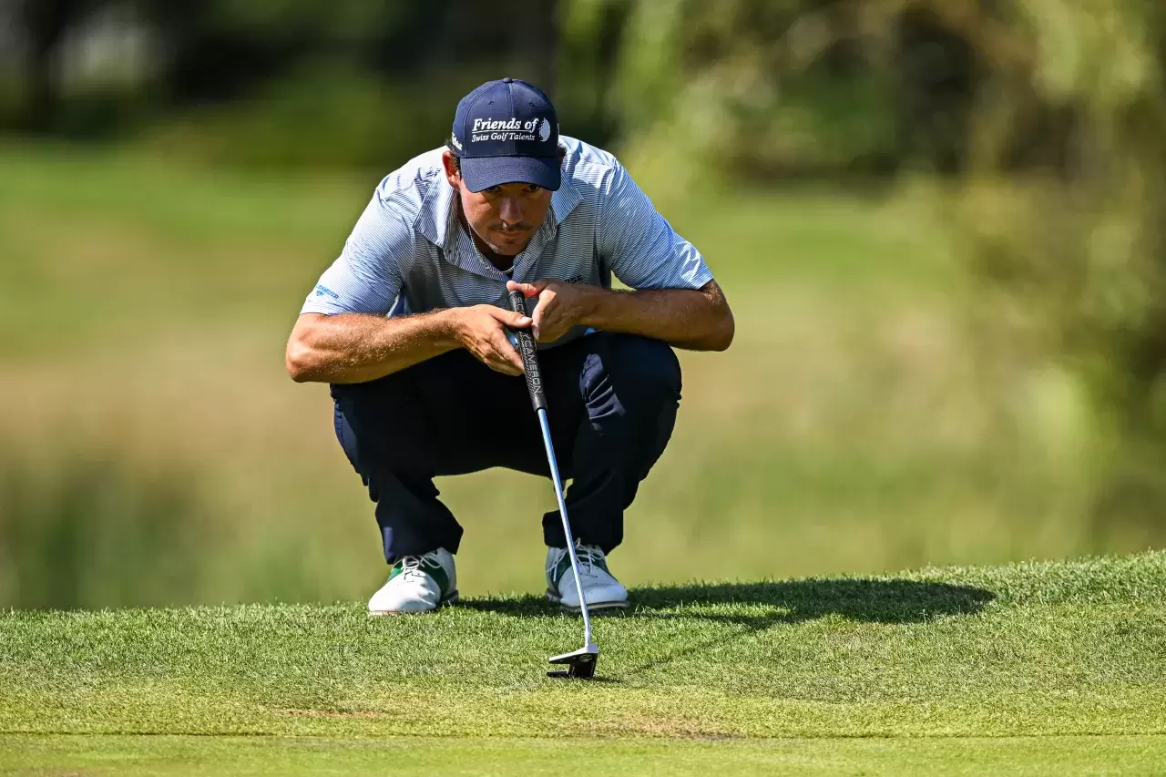 Jeremy Freiburghaus of Switzerland looks before plays his second shot on the 17th hole on day one of the Rosa Challenge Tour 2024 at Rosa Golf Club on August 29, 2024 in Konopiska, Poland
