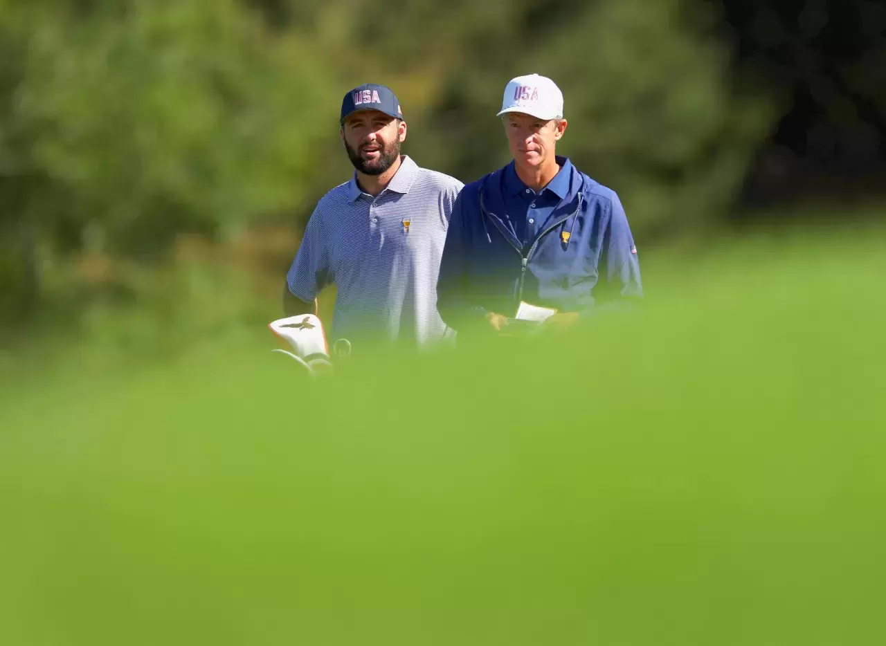 Scottie Scheffler and caddie Ted Scott