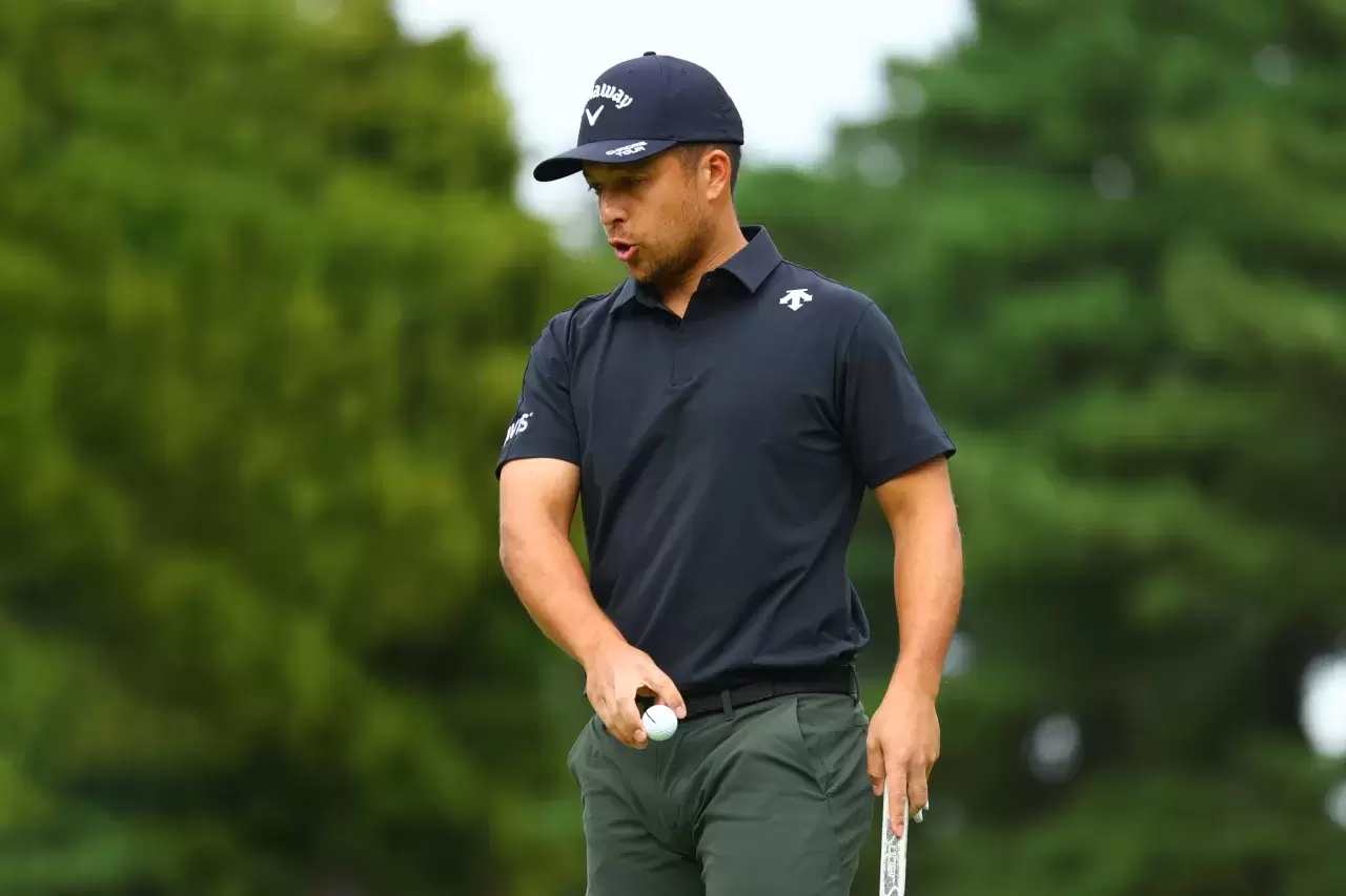 Xander Schauffele of the United States reacts after holing out on the 9th green during the second round of the Zozo Championship 2024