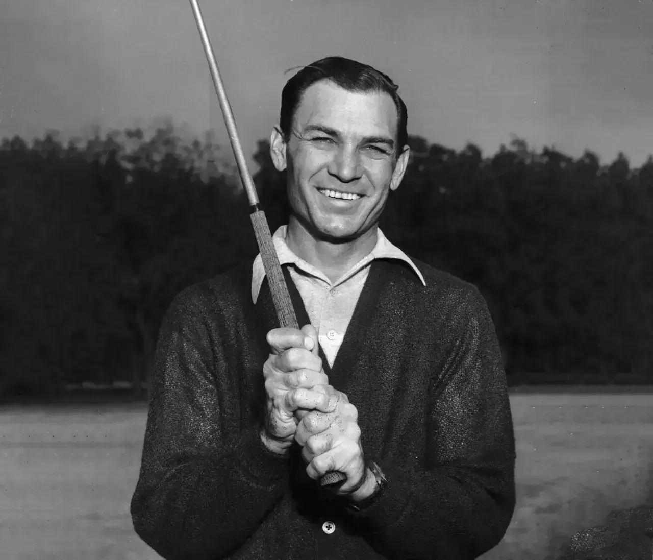 Golfer Ben Hogan 1912 1997 smiles while holding a golf club outdoor