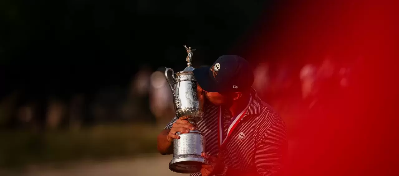 Bryson DeChambeau of the United States poses with the trophy after winning the 124th US Open at Pinehurst Resort 2024 in Pinehurst North Carolina