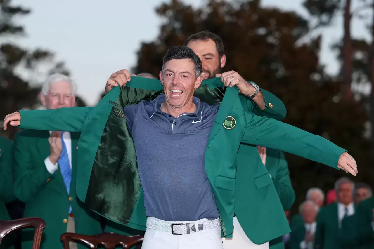 Rory McIlroy the Green Jacket by Masters Champion Scottie Scheffler Masters Tournament at Augusta National Golf Club 2025 in AugustaGeorgia