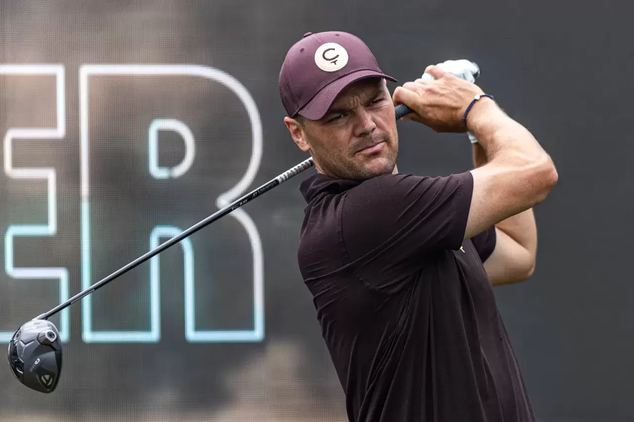 Captain Martin Kaymer of Cleeks GC hits his shot from the first tee during Day One of LIV Golf Miami at Trump National Doral Miami Florida