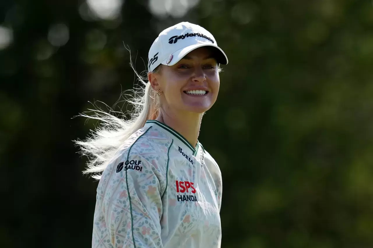 Charley Hull of England poses with the trophy after winning the Kroger Queen City Championship presented by P&G 2025 at TPC River's Bend on September 14 2025 in Cincinnati Ohio