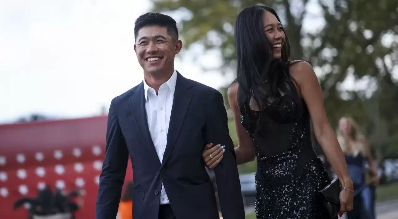 Collin Morikawa of Team United States and his wife Katherine Morikawa 