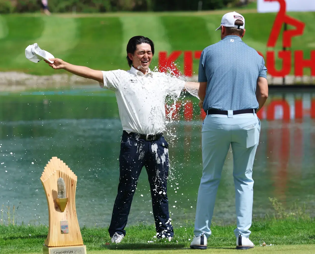 KITZBUEHEL, AUSTRIA - MAY 31: Bernd Wiesberger of Austria sprays Kota Kaneko of Japan with champagne following his victory on day four of the Austrian Alpine Open presented by Kitzbühel Tirol 2026 at Golfplatz Kitzbühel-Schwarzsee-Reith on May 31, 2026 in Kitzbuehel, Austria. 