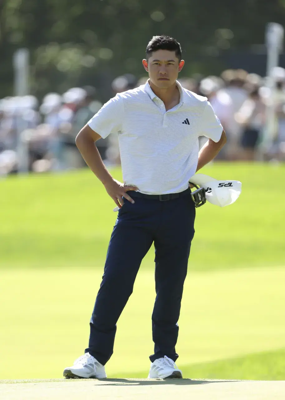 Collin Morikawa of the United States looks on while playing the 18th hole during the third round of the PGA Championship at Aronimink Golf Club